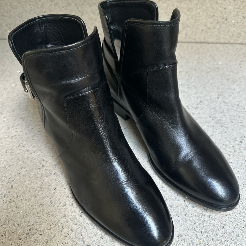 MK Black leather ankle boots with buckle detail 9